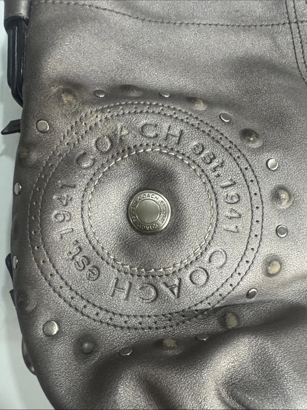 Coach Y2K Madison hobo bag featuring metallic pewter leather and silver studded